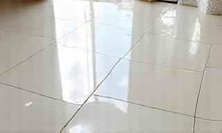 Sparkling clean tile floor reflecting light